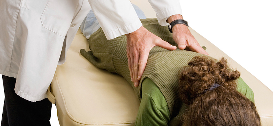 chiropractor doing spinal adjustment Toronto Chiropractic Care